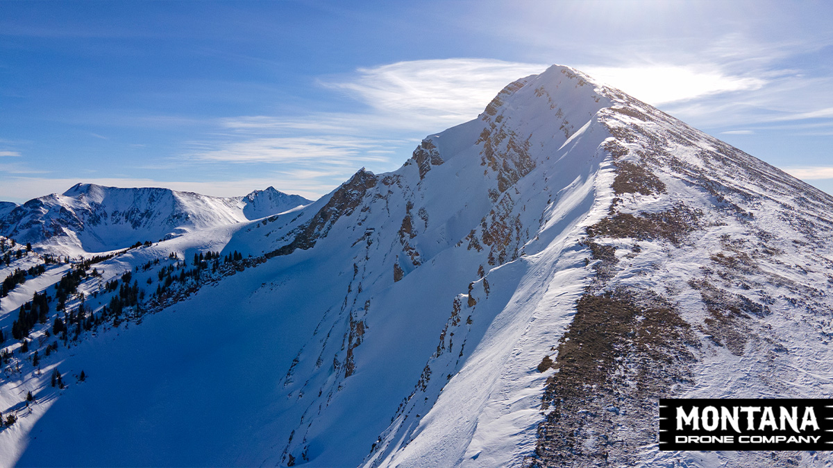 Climbing The Peak Winter Montana Mountains